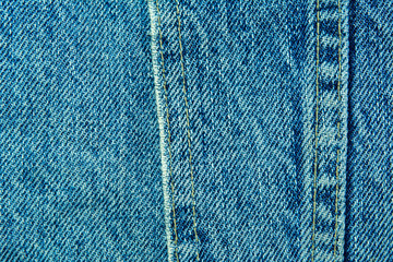 Blue denim fabric with seam