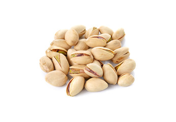 pile of salted pistachio nuts on white background