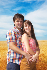 Man and woman on a wheat field