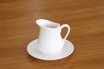 white ceramic milk jug