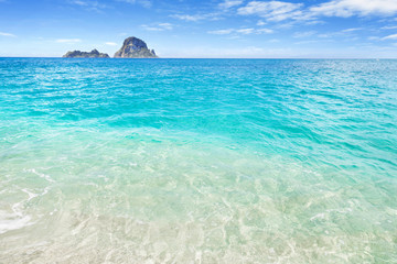 White sand beach and clear blue water, Ibiza, Spain - obrazy, fototapety, plakaty