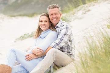 Smiling couple sitting together