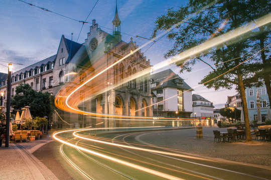 Erfurt City Hall with lights of a tram passing by