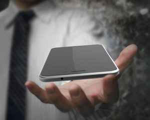 Businessman hand holding smart phone with black touchscreen