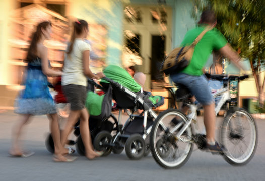 People on the street of the city. Intentional motion blur