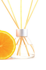 Fototapeta na wymiar air freshener sticks with a orange isolated