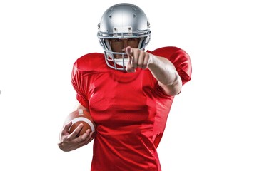 Portrait sports player in red jersey pointing © WavebreakmediaMicro