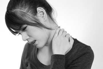 Young  woman with a pain in the neck