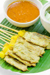 Grilled Pork Satay with Peanut Sauce and Vinegar, Thai food.