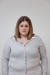Obraz premium Overweight woman with closed eyes portrait