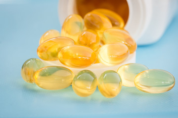 Fish oil capsules and container