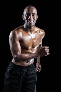 Happy Athlete Looking Away While Running