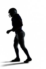 Silhouette American football player walking © WavebreakMediaMicro