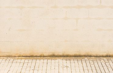 Hintergrund Steinmauer Weiß mit Gehsteig und Textfreiraum