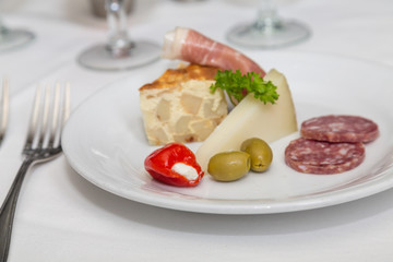 Appetizer Plate of Quiche Meats and Cheeses