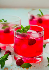 cold drink with raspberry, mint and ice