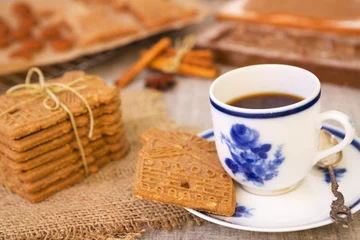 Foto op Plexiglas Cup of coffee with a typical Dutch speculaas cookie © sara_winter