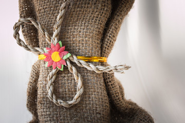 gift ribbon with flower bow on vintage background