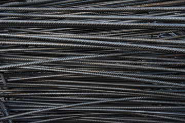 Artistic steel bars closeup, reinforcement on construction site, editable background. Steel bars or...