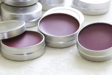 Purple lip balm with beeswax and aroma of redcurrant