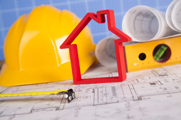 Yellow helmet, project drawings and house model