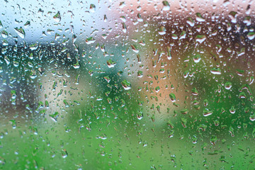 Natural water drops on glass