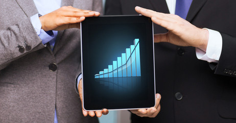 businessman and businesswoman with tablet pc