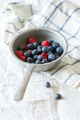 Colander with fresh berries
