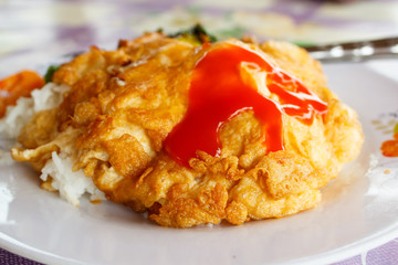 Rice topped with omelette.