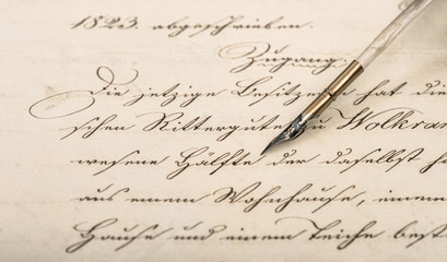 Letter with calligraphic handwritten text and vintage ink pen