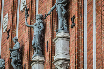 Sculptures on the facade of the House of Blackheads in Riga, Lat
