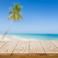 Wood table and blue sea background
