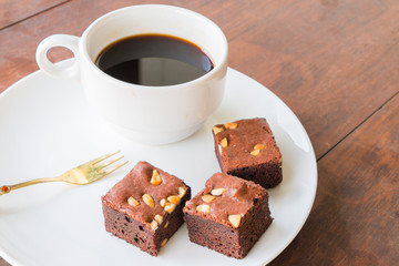 Brownies cake with cup of coffee