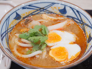 spicy ramen seafood with egg in bowl