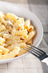 Penne with tomatos and parmesan cheese