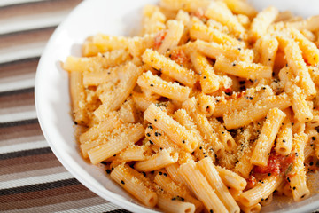 Penne with tomatos and parmesan cheese