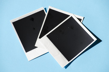 vintage retro instant photo on light blue background