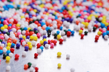 Fototapeta na wymiar Sugar sprinkle dots, decoration for cake and bekery 