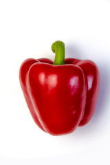 Rote Paprika mit Stengel auf weißem Hintergrund