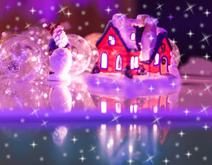 House with glowing windows, Christmas card