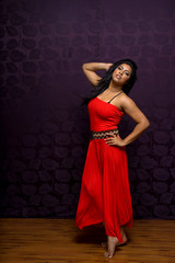 Fototapeta premium Indian Woman Wearing Beautiful Flowing Sleeveless Dress