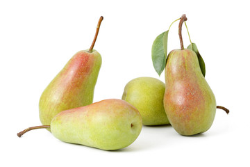 still life of four green pears with leaf on a white background i