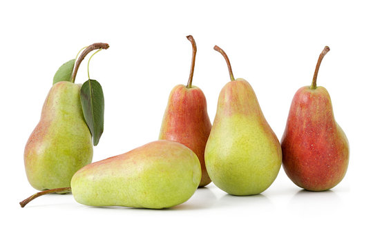 five green pears with leaf on a white background isolated