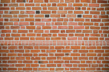 Medieval red brick wall