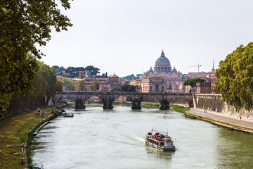 Fototapeta na wymiar San Pietro basilica and Sant angelo bridge in Rome