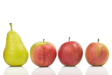 One pear among apples isolated on white background