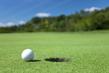 Golf ball close to the hole