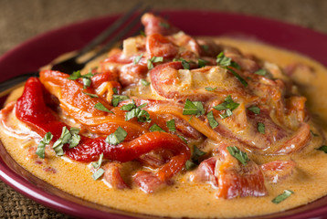Food of roasted peppers with cream