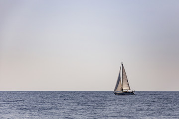 Fototapeta na wymiar Sailboat in the sea of Capri