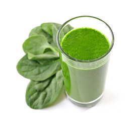 Glass of spinach juice isolated on white